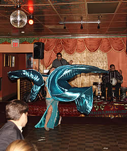 [Bonita dancing in blue costume with wings]